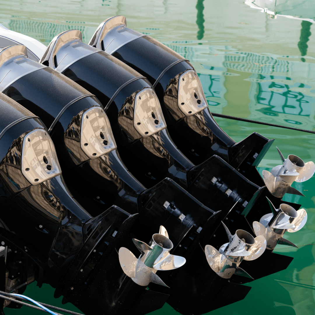 Close-up of a boat propeller system on water