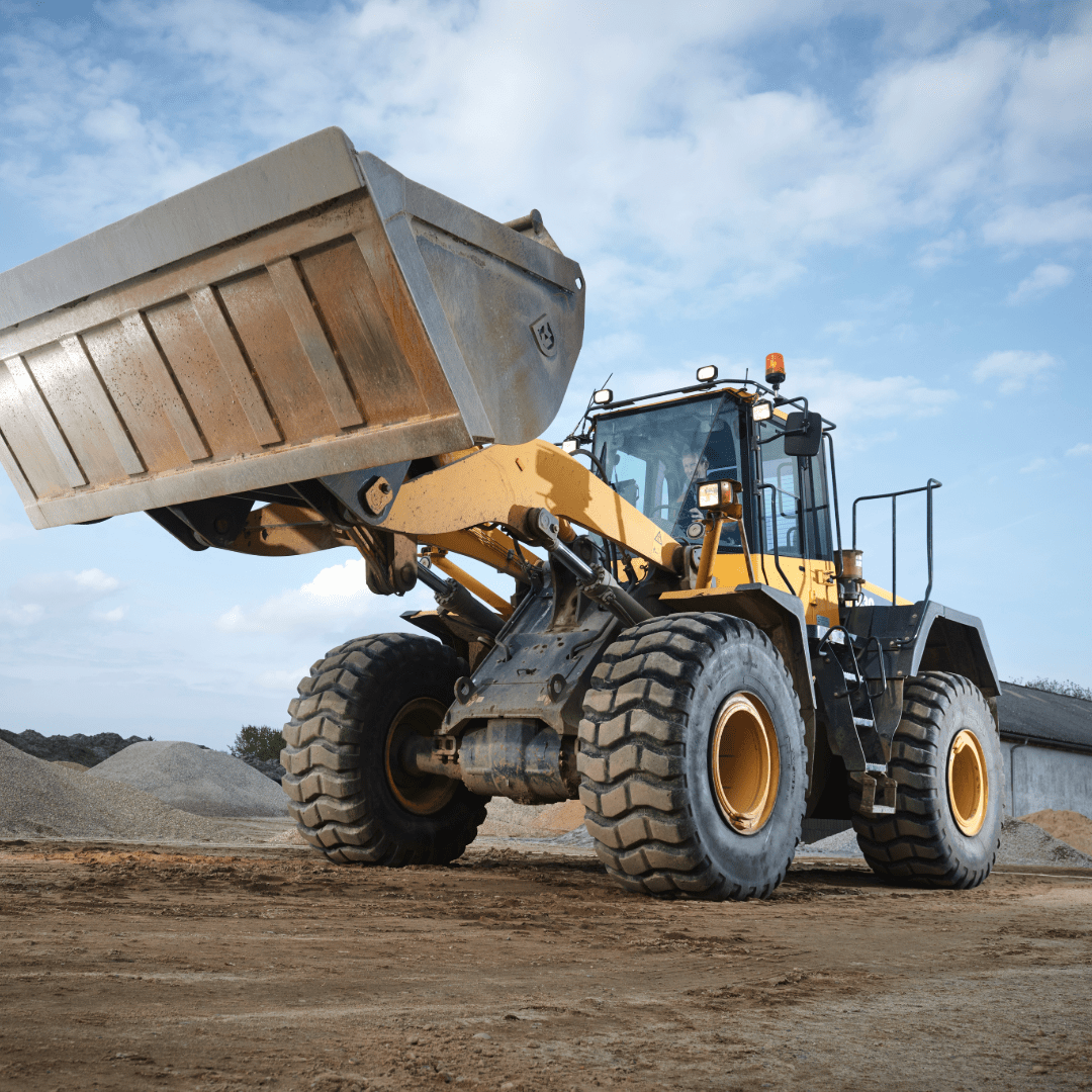 Construction vehicle with a large bucket on a construction site